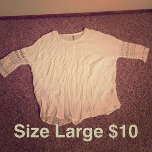 Cream top with lace detail on sleeve